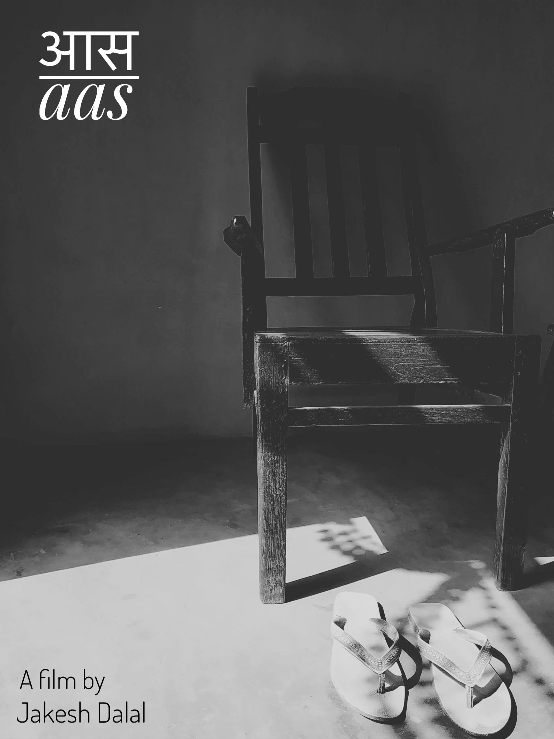 A wooden chair and a pair of sandals in a shaft of light, the poster for Aas